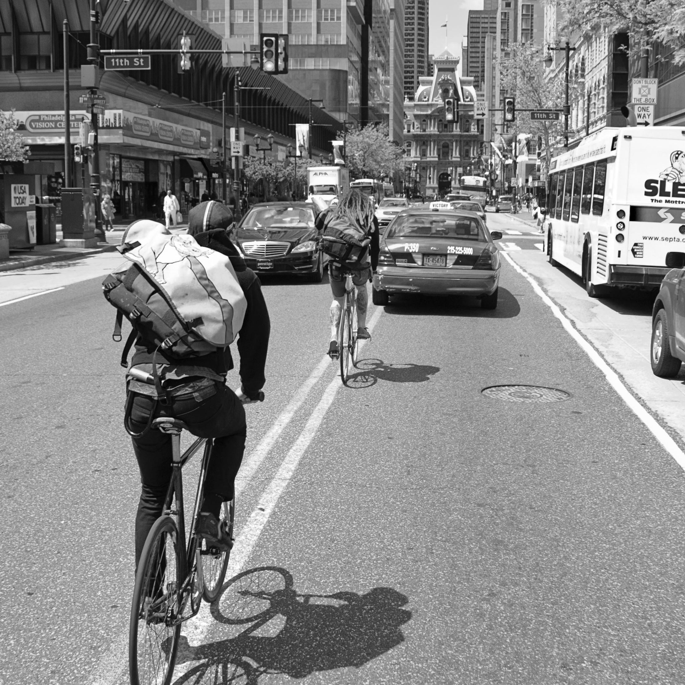 photo of messengers riding in traffic